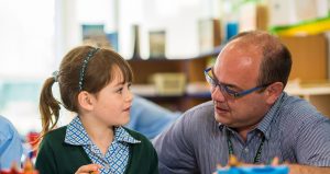 teacher with student