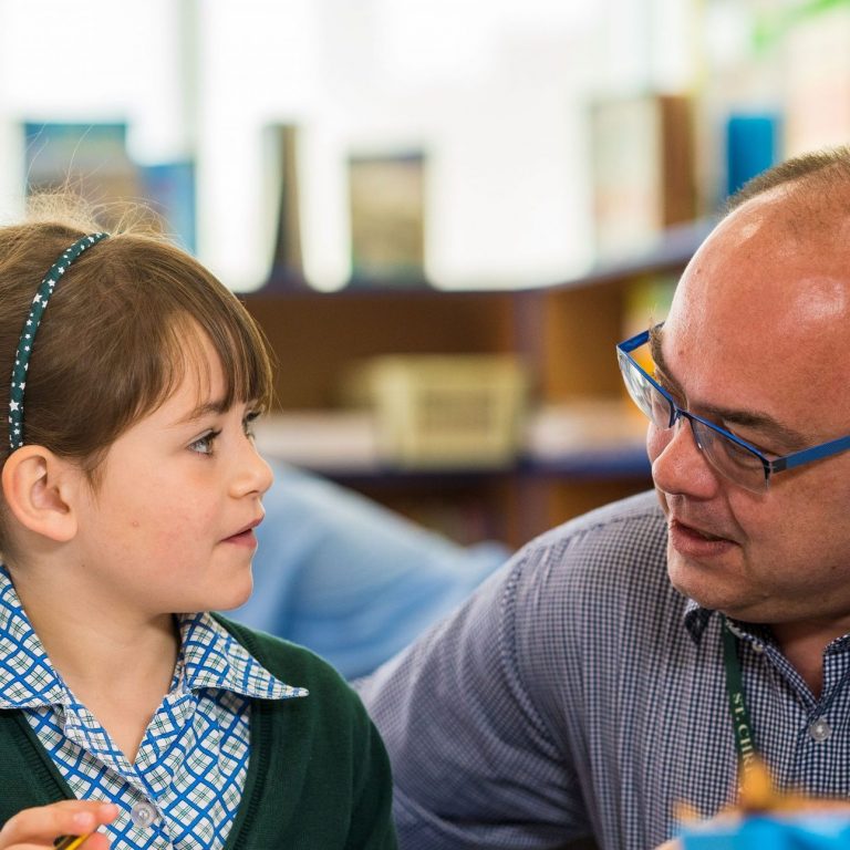 teacher with student